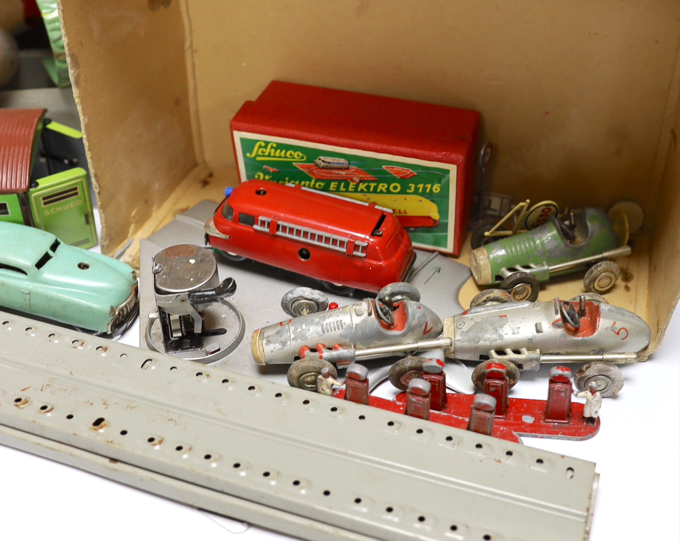 A boxed Matchbox Twin Thunderbolt Launcher set G-100, together with a quantity of Schuco Varianto items including four vehicles; a Varianto-Limo (3041), a Shell tanker, a fire engine, a pickup truck, garage, tunnel, trac